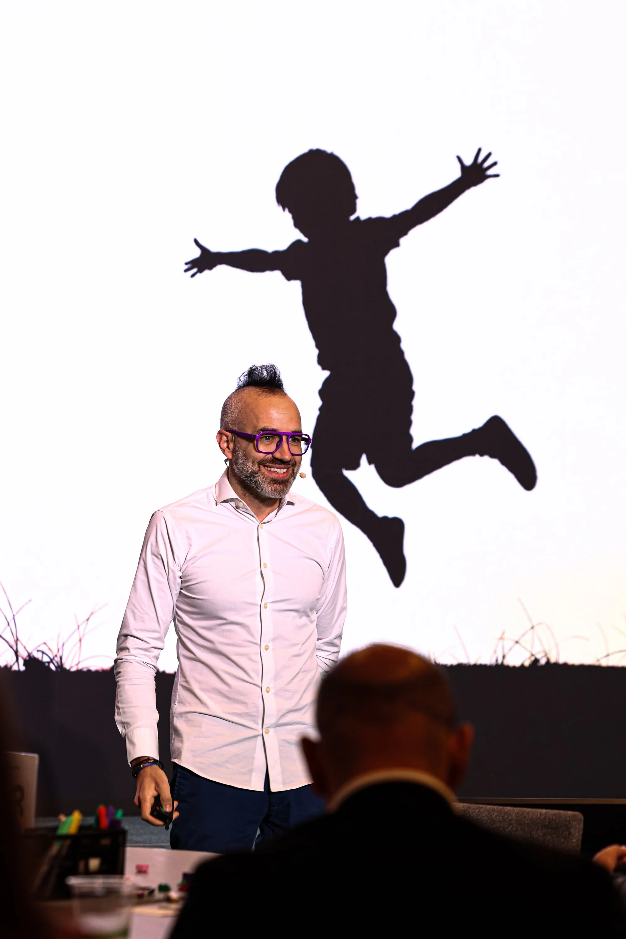 Adam Pantanowitz on stage during the Step Change closing keynote at the SingularityU Executive Program