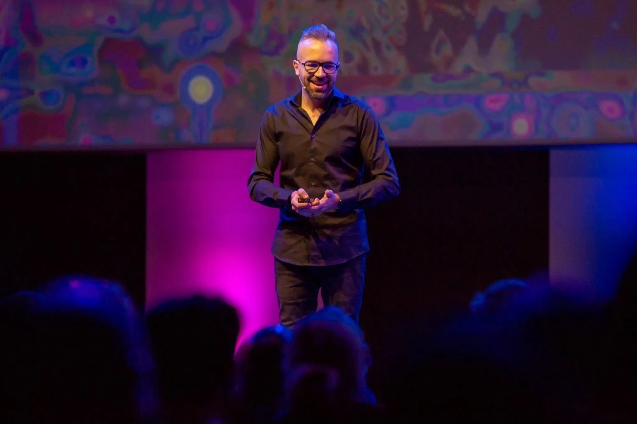 Adam Pantanowitz delivering Step Change at the Singularity University Summit, 2019