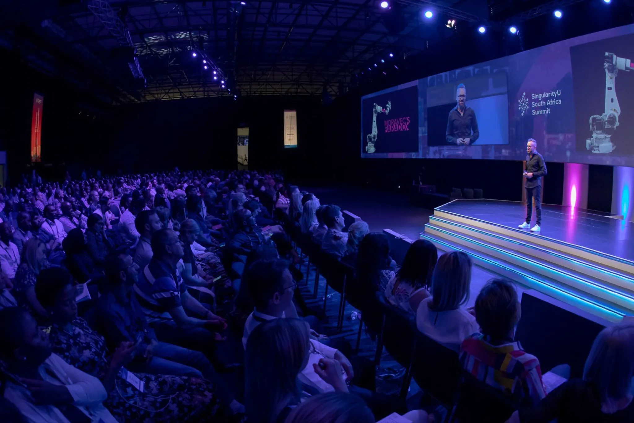 Adam Pantanowitz delivering Step Change at the Singularity University Summit, 2019