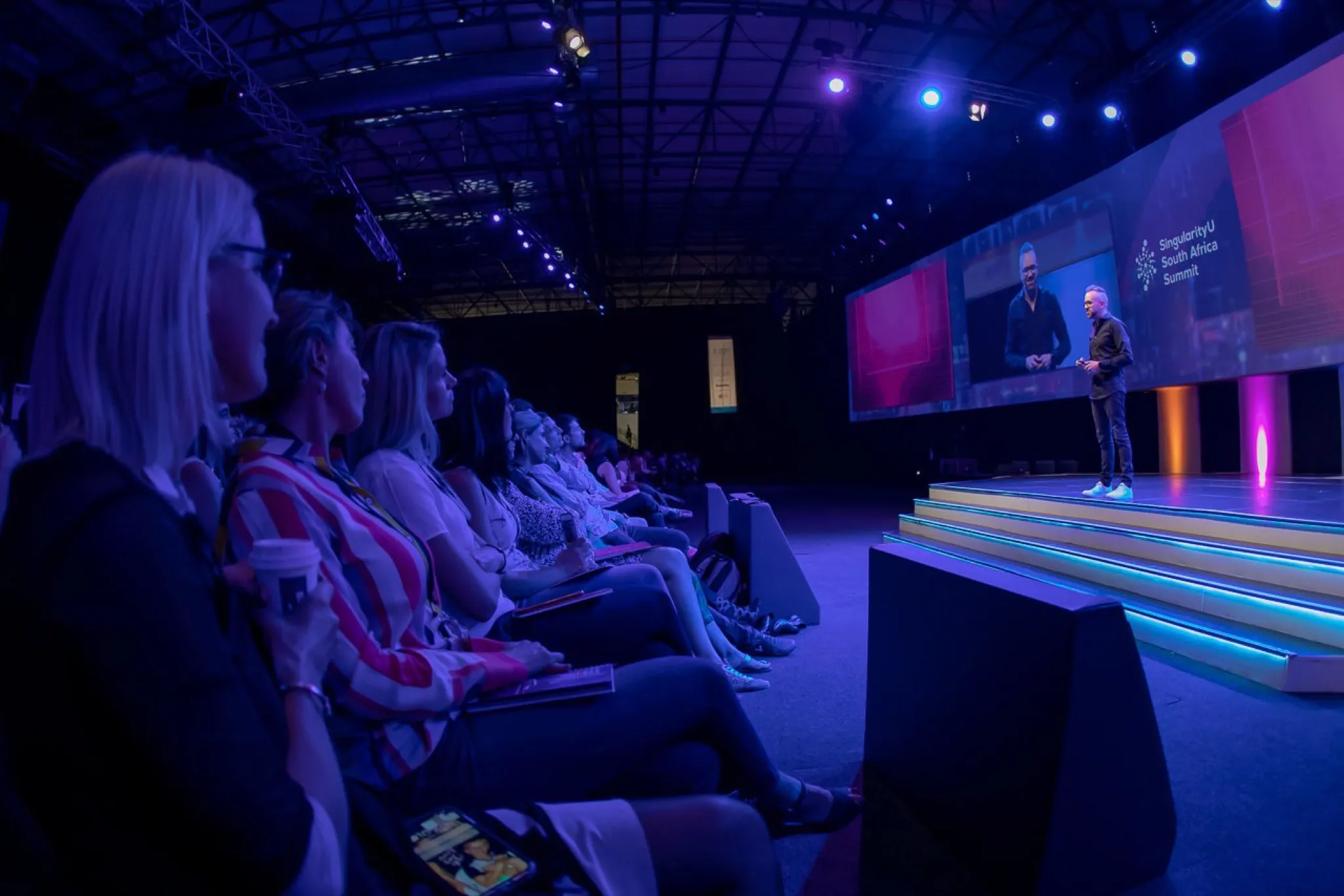 Adam Pantanowitz delivering Step Change at the Singularity University Summit, 2019