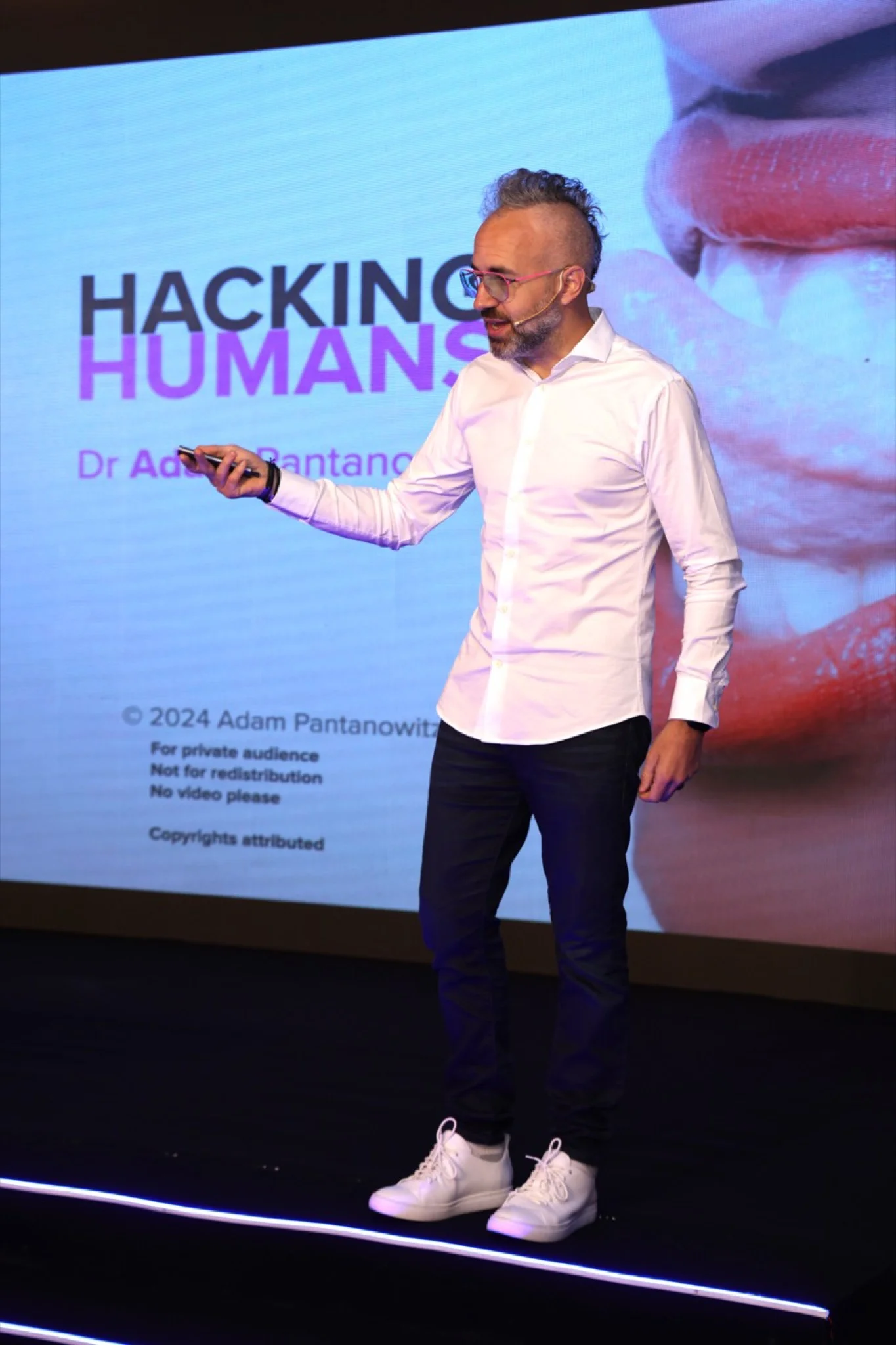 Adam Pantanowitz presenting Hacking Humans at Singularity University, India